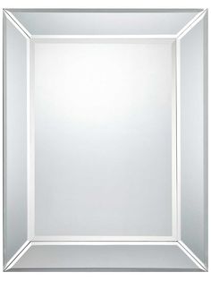 an empty square mirror on a white wall