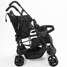 a black and white photo of a baby's stroller on a white background