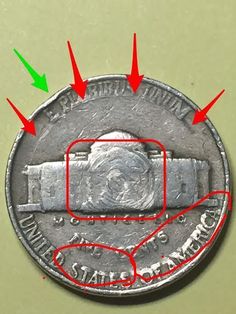 an image of a coin with arrows pointing to the camera