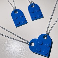 Blue Lego Heart Necklace Includes 2 Separate Necklaces That Connect To Form A Heart :) Super Cute For Couples Or Best Friends! Each Chain Is 18 Inches And Silver Plated, With Lobster Clasps (Available To Ship Within 1-5 Business Days Of Purchase) #Lego #Heart #Necklace #Legohearts #Gift Lego Heart Necklace Blue, Personalized Blue Heart Pendant Jewelry, Personalized Blue Heart Jewelry, Personalized Blue Heart Shaped Jewelry, Personalized Blue Heart-shaped Jewelry, Blue Heart Beads Necklace As Gift, Adjustable Blue Necklaces For Valentine's Day, Blue Adjustable Necklace For Valentine's Day, Adjustable Blue Necklace For Valentine's Day