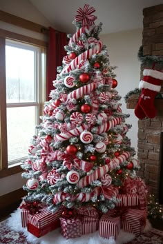 Dreaming of a bold holiday look? These red Christmas tree ideas are perfect for you! Combine red and green decorations with white, gold, and silver ornaments to create a striking color scheme. Perfect for adding a festive and stylish touch to your Christmas decor. Green And Red Ornaments Christmas Tree, Red And White Whimsical Christmas Tree, Green Christmas Tree With Red And White Decorations, Christmas Tree Ideas 2024 Trends Red, Red And White Themed Christmas Tree, Red And White Christmas Tree Decor, Cute Christmas Tree Ideas Themed, Christmas Tree Ideas Red White, Red White Black Christmas Tree