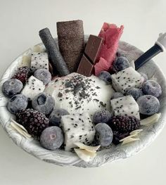 a bowl filled with different types of desserts