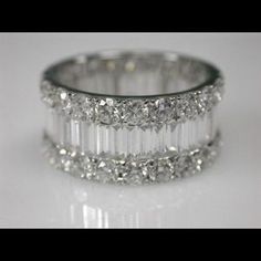 three rows of diamonds on top of each other in white gold and diamond band ring