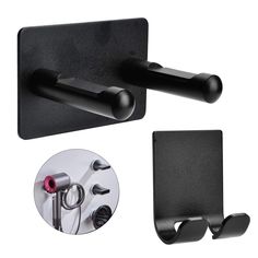 a pair of black wall mounted hooks with one hook attached to the back of it