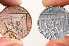 two different types of coins being held in their hands