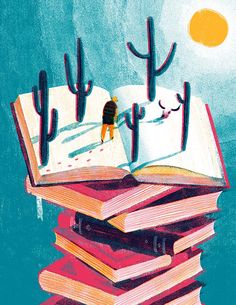 an open book sitting on top of a pile of books next to cacti