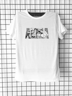 a white t - shirt with the word africa printed on it in black and white