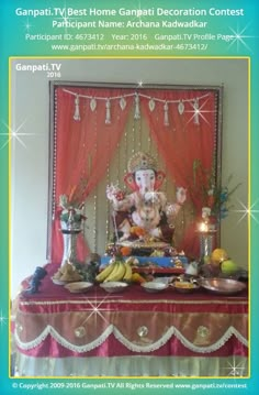 the ganpati decoration is displayed in front of a red curtain