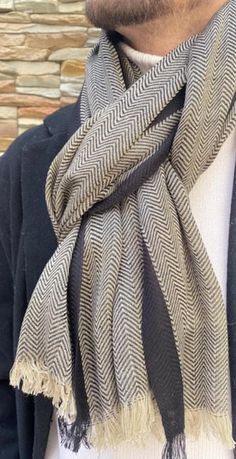 Scarf, Chic scarf for men, easy to wear. Ideal for pairing with both dressy outfits and a more casual wardrobe. A very chic, timeless masculine accessory Chevron Pattern 100% Woven Viscose One size - 70x180 cm Washable at 30 degrees - Gentle iron on reverse side Handmade Scarf For Men, Men’s Silk Scarf Outfit, Mens Silk Scarf, Luxury Men's Scarves, Men’s Scarves, Luxury Men's Scarf, Muffler Men, Scarves Men, Man Scarf