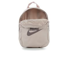 Durable polyester construction,9 1/2 inch H x 8 1/4 inch W x 3 1/2 inch D, Adjustable straps, Large main compartment, Small front pocket, Two open side pockets, Nike branding details | Nike NSW Futura 365 Mini Backpack in Fossil/Plum Small Backpack For School, Cute Backpacks Nike, Mini Bag Nike, Nike Sporty Everyday Backpack, Practical Nike School Bags, Nike Futura 365 Mini Backpack, Nike Backpack, Aesthetic Backpack, Nike Branding