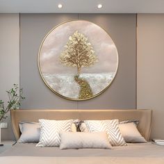 a bedroom with a large round painting on the wall next to a bed and pillows