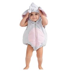 a baby in a bunny costume standing up