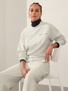 FOR: Lounge and everyday FEEL: Plush stretch fleece has a soft, brushed interior FAVE: Embroidered slogan for everyday empowerment Relaxed with room to move or layer Body length: Regular 22.6", Petite 21.6", Tall 23.6". Bra Dress, Crew Sweatshirts, Jacket Tops, Dress Accessories, Womens Clothing Tops, Heathers, Lounge, Luxury Fashion, ? Logo