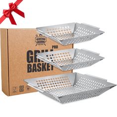 three stainless steel baskets in front of a cardboard box