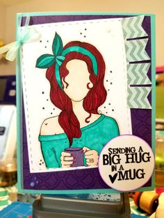 a close up of a card with a woman holding a coffee cup on top of it