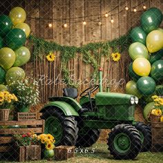 a tractor parked in front of balloons and flowers