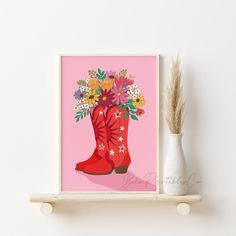 a red boot with flowers in it on a shelf