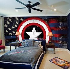 a bedroom decorated in the colors of the american flag and captain america's shield