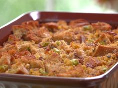 a casserole dish with meat and vegetables in it