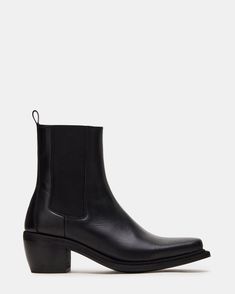 Step out in style with our METRO bootie . Featuring a sleek square toe and chic ankle boot design, this everyday chelsea boot is the epitome of sophistication. Crafted with a gore stretch for added comfort, it's the perfect combination of fashion and function.  2.25 inch heel height 9.5 inch shaft circumference 6 inch shaft height Leather upper material Synthetic lining Synthetic sock Synthetic sole Imported Black Ankle Boots 3 Inch Heel, 2025 Style, Chelsea Boots Heel, Boot Design, Chelsea Boots Women, Black Leather Ankle Boots, Black Chelsea Boots, Designer Boots, Chelsea Boot