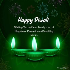 happy diwali greeting card with three lit candles and fireworks in the dark green background