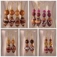 several different types of earrings hanging from hooks