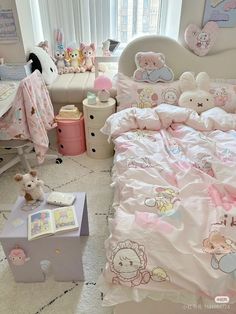 a child's bedroom decorated in pink and white with teddy bears on the bed