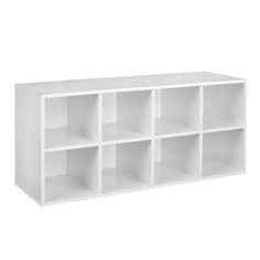 a white shelf unit with six compartments