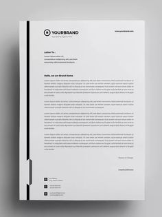 a white letterhead with black lines on it