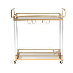 a gold and clear bar cart with two glass shelves