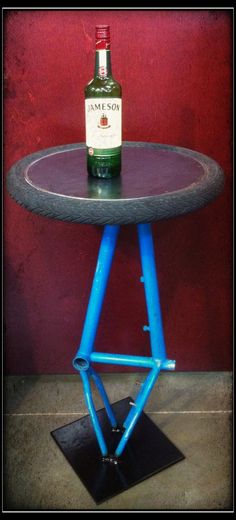 a bottle of wine sitting on top of a table with a blue frame around it