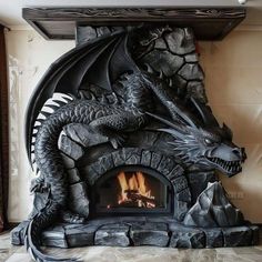 a fireplace with a dragon statue sitting on top of it