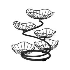 three metal baskets on top of each other in the shape of trees with leaves attached to them