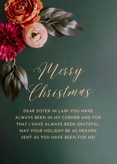 a merry christmas card with flowers on the front and back of it, in gold lettering