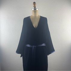 Nili Lotan L L Rochelle Rayon Silk Velvet Surplice Bodice Raw Cuff Kimono Dress. Fits Approximately : Large; Label States L - Relaxed Fit. Bust : Waist : Length : Pre-Owned. Excellent Condition. Gently Worn. 0000 New To Poshmark? Use Code "Shesabettie" For $10 Off Your First Purchase! Nili Lotan, Kimono Dress, Silk Velvet, Waist Length, Bodice, Relaxed Fit, Cuff, Velvet, Silk