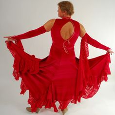 will fit size 9/10-13/14, stretchy …5″7″ or taller This opulent red stretch velvet ballroom dress captivates with its clip-n-cut chiffon insets and flounces that create a unique, mesmerizing look and effortless swish when you dance. Glimmering CAB Swarovski rhinestones plus an inset traversing the bodice and matching gauntlets with small floats make this a must-have for standard and American smooth styles. Not to mention, the keyhole back adds subtle sophistication. Unmissable offer - don't miss Red Velvet Gala Dress, Red Fitted Floor-length Velvet Dress, Fitted Floor-length Red Velvet Dress, Fitted Red Velvet Floor-length Dress, Red Fitted Velvet Dress For Weddings, Fitted Red Velvet Dress For Wedding, Red Velvet Dress With Fitted Bodice, Red Stretch Evening Dress For Gala, Elegant Fitted Gown For Dance