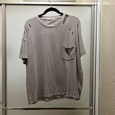 This Is A Fresh Free People Shirt. For Some Reason I Took Off The Tag But Is New I Never Wear The Style Is With Some Wholes. Summer Gray Distressed Tops, Gray Distressed Tops For Summer, Distressed Tshirt, New Me, Free People Tops, Gray Color, Free People, Brand New, Womens Tops