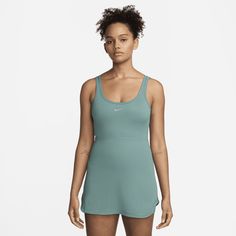 Up for a workout or down to chill, this slim-fitting dress is ready for whatever you are. Midweight, peachy-soft ribbed fabric stretches with your every move and dries quickly. Plus, built-in knit shorts with a left pocket offer both added coverage and storage. Spring Moisture-wicking Tennis Dress, Spring Workout Tennis Dress In Solid Color, Spring Workout Fitted Tennis Dress, Spring Workout Solid Color Tennis Dress, Spring Solid Tennis Dress For Workout, Spring Solid Color Tennis Dress For Workout, Fitted Spring Tennis Dress In Athleisure Style, Fitted Tennis Dress In Athleisure Style For Spring, Fitted Tennis Dress For Spring In Athleisure Style