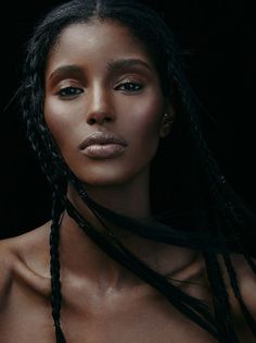 an image of a woman with braids on her head and the words black beauties