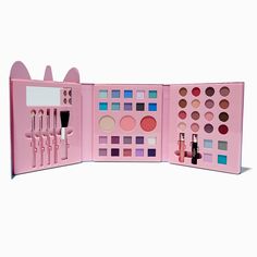 Decorated with a unicorn design, this makeup set has everything you need for your daily makeup routine, like eyeshadows, blushes, lip colors, and five different applicators. There's even a mirror inside for touchups throughout your day; just fold it up, tuck it into your bag, and go!6.5W x 7H x 1D in. (closed) / 16.51W x 17.78H x 2.54D cm. (closed)Materials: Powder/Cream - Claire's Ombre Unicorn 48 Piece Makeup Set Claire's Makeup, Unicorn Makeup Brushes Set, Unicorn Makeup Brushes, Crown Hair Clip, Sensitive Ears Earrings, Daily Makeup Routine, Flower Crown Hairstyle, Unicorn Makeup, Special Occasion Hairstyles