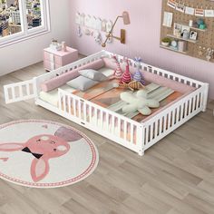 a child's bedroom with pink walls and flooring