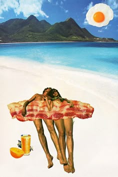 a woman laying on top of a beach next to an orange juice and bacon sandwich