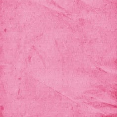 a pink paper textured with some type of writing on it's edges and bottom corner