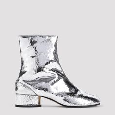 Maison Margiela Tabi H30 Silver Calf Leather Ankle Boots. Crafted with silver and crinkle calf leather, iconic Tabi toe, zipper closure, ankle length, block heel, leather lining and outsole. Tabi Boots, Maison Margiela Tabi, Margiela Tabi, Leather Cap, Designer Boots, Small Handbags, Small Leather Goods, Leather Ankle Boots, Mens Shoes Sneakers