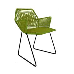 a green chair sitting on top of a metal frame