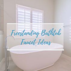 a white bath tub sitting in a bathroom next to a window with the words freestanding bathtub faucet ideas