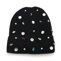 Accessorize any outfit with our most loved bling fashion beanie. Knit ribbed beanie with assorted gem and pearl accents. Soft lining inside. 50% polyester 50% acrylic Rhinestone Beanie, Fashion Beanie, Beanie Knitting, Bling Fashion, Cute Beanies, Beanie Black, Black Beanie, Upcycle Projects, Fashion Pieces