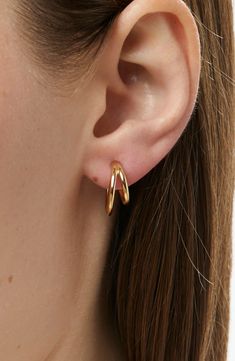 These modern and sleek gold hoop earrings will give you the perfect double-stack look with just one piercing. Carefully handcrafted and dipped in 14k gold, these double hoop earrings are great for both a regular office day and a rock concert. Versatile gold double hoop earrings Lightweight & comfortable to wear all day long Easy to style with other gold jewelry Width: 15.1mm - 0.6" Depth: 6.1mm - 0.24 Weight: 1.7g Hoop Diameter: 15.1mm - 0.6" Post: Titanium Post Crafted In China Double Hoops Earring, Office Wear Earrings, Small Earrings Gold, Earring Stack, Double Earrings, Double Piercing, Second Piercing, Earrings Double, Double Hoop Earrings