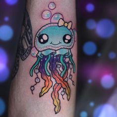 an octopus with a bow on it's head and some bubbles in the background