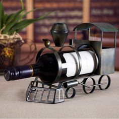 a wine bottle holder sitting on top of a table